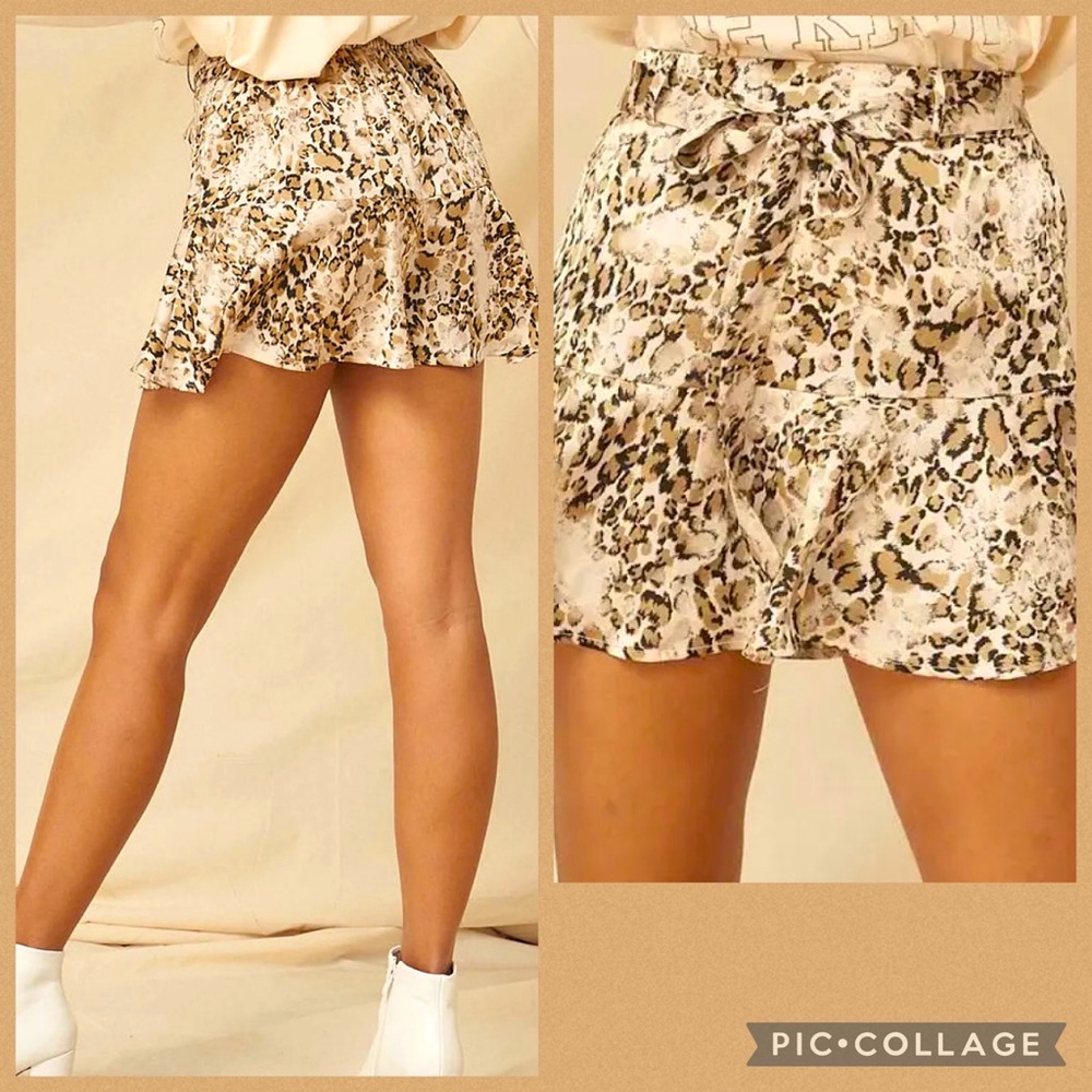 Wild 🐆Style Animal-Print Belted Ruffle Skort
Animal-print satin skort.🐆NWT